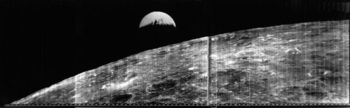 Earthrise over the Moon taken by Lunar Orbiter 1 on 08/23/1966. This is the first good image of the Earth taken from the vicinity of the Moon, 380,000 km away.